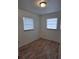 Cozy bedroom with updated floors and neutral paint at 444 Sunnyview Cir, Orlando, FL 32810