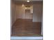 Open-concept living area with views to the kitchen and front door at 444 Sunnyview Cir, Orlando, FL 32810