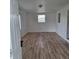 Inviting living room featuring new floors and natural light at 444 Sunnyview Cir, Orlando, FL 32810