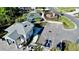 Aerial view of community amenities including a playground, basketball court, and parking at 4512 Sparkling Shell Ave, Kissimmee, FL 34746
