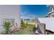 Backyard with a view of a community lake and new construction homes at 4512 Sparkling Shell Ave, Kissimmee, FL 34746
