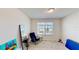 Bright bedroom featuring neutral walls, large windows and comfy furnishings at 4512 Sparkling Shell Ave, Kissimmee, FL 34746