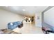 Spacious living room that combines kitchen, living, and entertainment spaces for modern living at 4512 Sparkling Shell Ave, Kissimmee, FL 34746