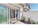 A sliding glass door opens to a private patio space at 4512 Sparkling Shell Ave, Kissimmee, FL 34746