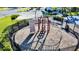 Community playground featuring a climbing wall and a spiral staircase at 4512 Sparkling Shell Ave, Kissimmee, FL 34746
