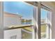 Serene water view from this home's window, showcasing the beautiful landscape and surrounding community at 4512 Sparkling Shell Ave, Kissimmee, FL 34746