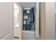 HVAC system access and utility closet adjacent to the bathroom at 5206 Cortez Dr, Orlando, FL 32808