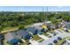 An aerial view of this property showcasing the surrounding area and a nearby city skyline at 536 Southern Charm Dr, Orlando, FL 32807