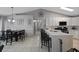 Open concept kitchen flows seamlessly into the dining area, creating a welcoming space at 536 Southern Charm Dr, Orlando, FL 32807