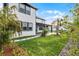 Beautiful backyard features a lush lawn, patio, and professional landscaping, enhancing outdoor living at 6439 Trailblaze Bnd, St Cloud, FL 34771