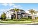 Charming home featuring manicured landscaping, a lush lawn, and a stylish exterior design for great curb appeal at 6439 Trailblaze Bnd, St Cloud, FL 34771