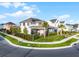 Modern two-story home with professionally landscaped yard, black fence, and a two-car garage at 6439 Trailblaze Bnd, St Cloud, FL 34771