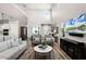 Inviting living room features soaring ceilings and abundant natural light at 6439 Trailblaze Bnd, St Cloud, FL 34771