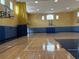 A community basketball court features a pristine court for friendly games and activities at 6575 Time Square Ave # 101, Orlando, FL 32835