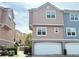 Attached two car garage on a well maintained townhome in a residential community at 6575 Time Square Ave # 101, Orlando, FL 32835