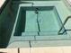 A community hot tub with tile accents offers a great place to unwind and relax at 6575 Time Square Ave # 101, Orlando, FL 32835