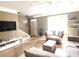 Comfortable living room with a large window for natural light and tile flooring at 6575 Time Square Ave # 101, Orlando, FL 32835