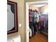 Spacious walk-in closet with ample storage, shelving, and organized clothing racks at 6575 Time Square Ave # 101, Orlando, FL 32835