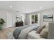 Bright main bedroom featuring a walkout to the backyard and neutral decor at 7320 Fieldcrest Ave, Winter Park, FL 32792