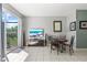Cozy living room with sliding doors to the outdoor space and modern entertainment setup at 7666 Sir Kaufmann Ct, Kissimmee, FL 34747