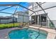 Backyard pool and patio area perfect for outdoor relaxation and entertainment at 7666 Sir Kaufmann Ct, Kissimmee, FL 34747
