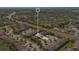 An aerial photograph features a targeted townhome exterior with surrounding landscaping and neighborhood layout at 10124 Shadow Leaf Ct, Orlando, FL 32825
