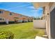 Backyard features a lawn and privacy fence at 10124 Shadow Leaf Ct, Orlando, FL 32825