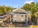 Exterior view of a two story condo building with stairs and walkway at 1013 S Hiawassee Rd # 3628, Orlando, FL 32835