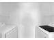 A well-lit laundry room with updated washer and dryer at 1013 S Hiawassee Rd # 3628, Orlando, FL 32835