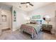 Cozy bedroom with an accent wall, closet and decorative bedside lamps and mirrors at 10255 Beechwood Ln, Orlando, FL 32832