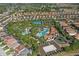 The community boasts a large pool area, tennis courts, and well-maintained landscaping in a residential neighborhood at 1158 Oak Bluff Dr, Davenport, FL 33837