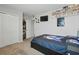 Cozy bedroom featuring a queen bed, large closet, and neutral color scheme at 1158 Oak Bluff Dr, Davenport, FL 33837