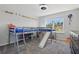 Fun bedroom with a loft bed, slide, toys, and plenty of space for activities at 1158 Oak Bluff Dr, Davenport, FL 33837