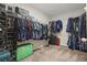 Spacious walk-in closet, perfect for organization and storage of your wardrobe and accessories at 1158 Oak Bluff Dr, Davenport, FL 33837