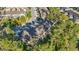 Community townhomes featuring well-maintained landscaping and architecture, surrounded by lush greenery, offering a serene living environment at 1284 Pavia Dr, Apopka, FL 32703