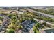 Aerial view of the townhomes; convenient access to nearby highways, shopping, and dining options with community amenities at 1284 Pavia Dr, Apopka, FL 32703