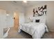 A bright and airy bedroom with a comfortable bed, study desk and lots of natural light at 1284 Pavia Dr, Apopka, FL 32703