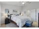 Stylish bedroom featuring soft decor, a comfortable bed, and complementary furniture, creating a cozy and restful environment at 1284 Pavia Dr, Apopka, FL 32703