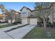 Beautiful townhouse featuring a private drive and welcoming front garden at 1284 Pavia Dr, Apopka, FL 32703