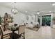 Inviting living room with stylish décor and access to an outdoor patio at 1284 Pavia Dr, Apopka, FL 32703