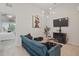Bright living room showcasing chic decor, contemporary lighting, and comfortable seating, perfect for relaxation and entertaining guests at 1284 Pavia Dr, Apopka, FL 32703