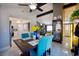 Dining area showcases stylish decor, vaulted ceilings, and views into the kitchen at 140 Pinesong Dr, Casselberry, FL 32707