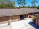 Charming home featuring a well-maintained exterior, two-car garage, and beautiful landscaping at 140 Pinesong Dr, Casselberry, FL 32707