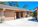 Charming one-story home with attached garage, covered entry and front yard landscaping at 140 Pinesong Dr, Casselberry, FL 32707