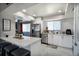 Bright kitchen boasts granite countertops, stainless steel appliances, and stylish white cabinetry at 140 Pinesong Dr, Casselberry, FL 32707