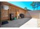 Private outdoor patio area with a grill, storage, and decorative latticework at 140 Pinesong Dr, Casselberry, FL 32707