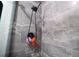 Stylish shower featuring modern gray stone tile and a handheld shower head at 140 Pinesong Dr, Casselberry, FL 32707