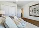 Bright bedroom with stylish decor, neutral color palette, and ample natural light at 14432 Orchid Island Dr, Orlando, FL 32827
