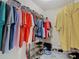Walk-in closet with shelving and hanging racks for organized storage of clothing and shoes at 14432 Orchid Island Dr, Orlando, FL 32827