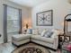 Comfortable living room features neutral decor, plush sectional sofa, and decorative accents at 14432 Orchid Island Dr, Orlando, FL 32827